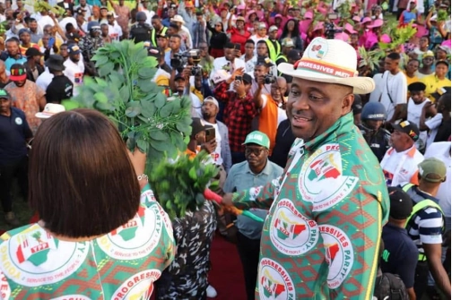 OBA among a large gathering during a celebration